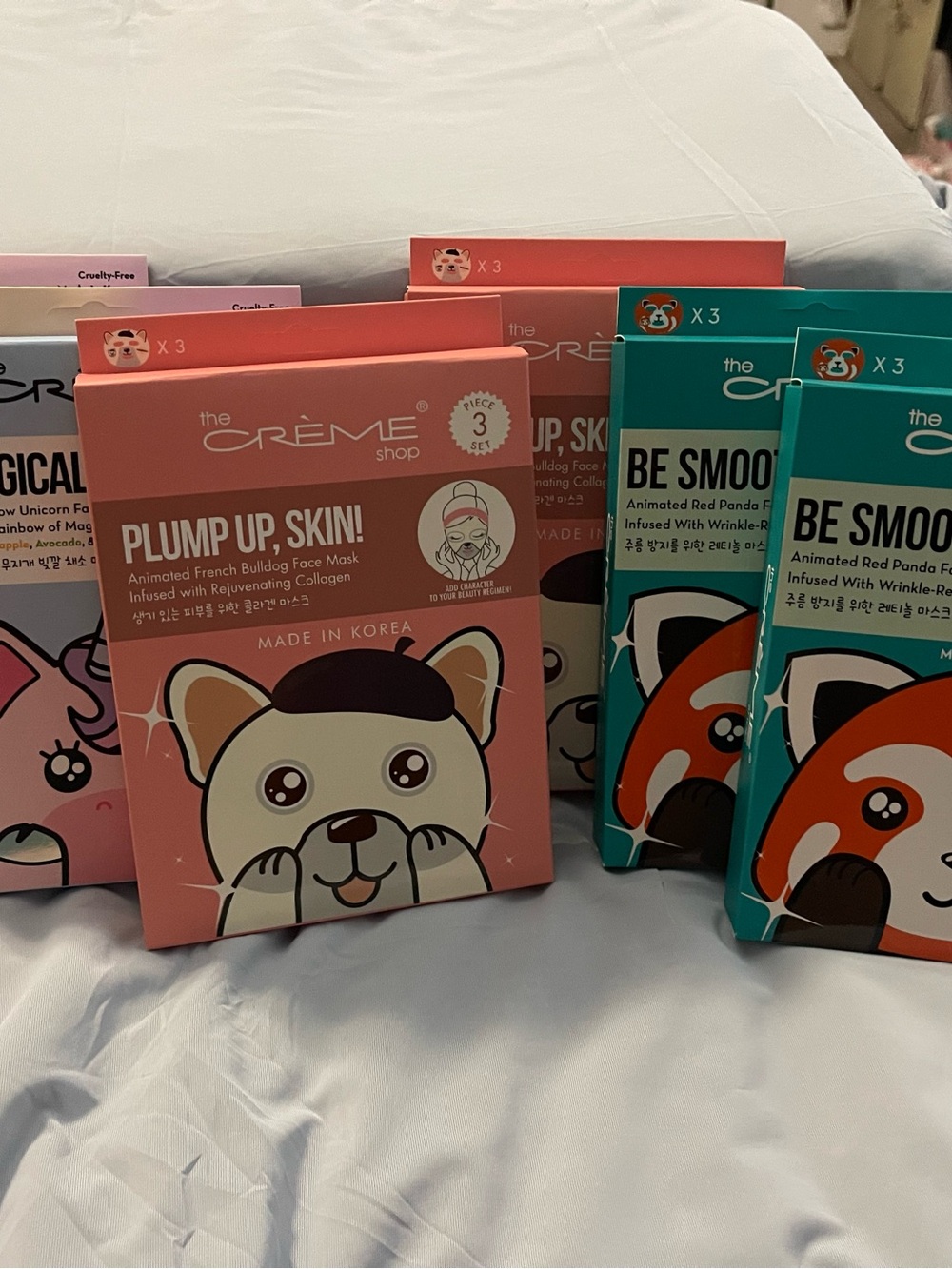 2 boxes each with 3 face masks in each box
